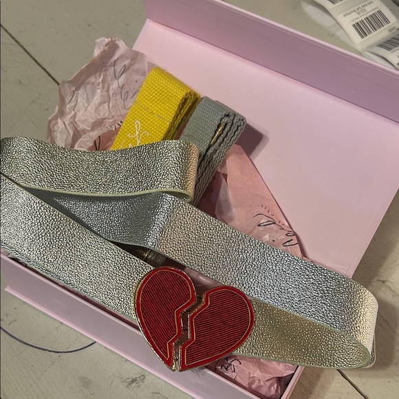Elegant Silver Belt with Red Heart Accent